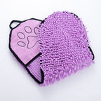 Purple microfiber cleaning mitt with paw design on a white background