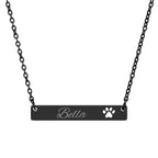 Black bar necklace with 'Bella' and a paw print on a white background