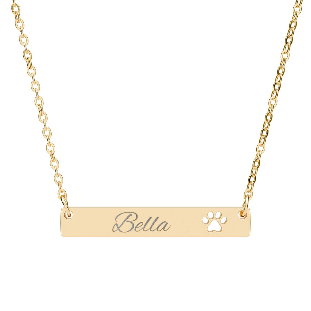 Gold necklace with 'Bella' engraving and paw print on a white background