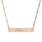 Rose gold necklace with 'Bella' and paw print on a white background